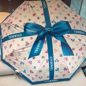 CHANEL White Umbrella with Multicolor Logos and Blue Ribbon